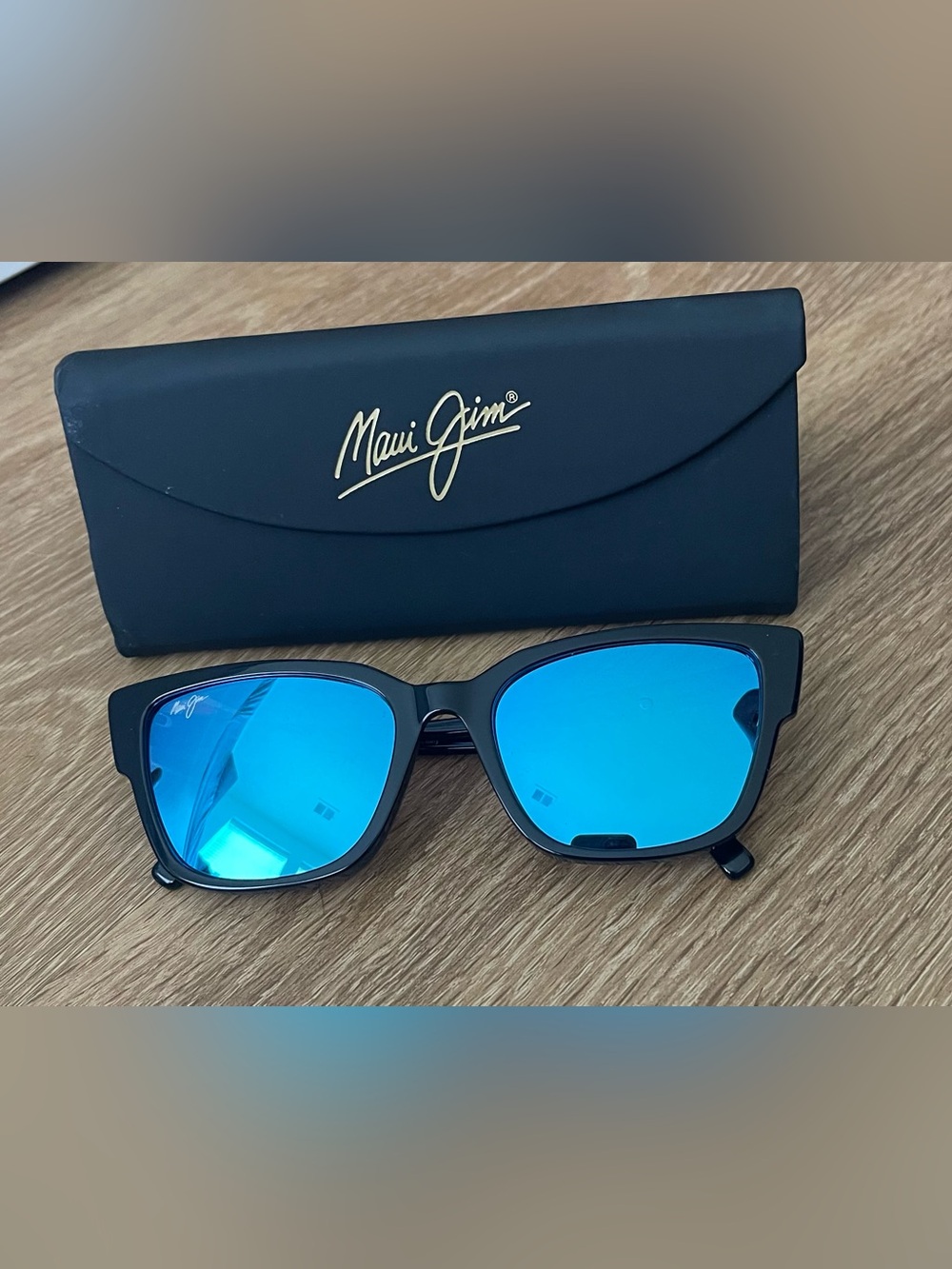 Maui Jim Black Frame Sunglasses with Bright Blue Lenses